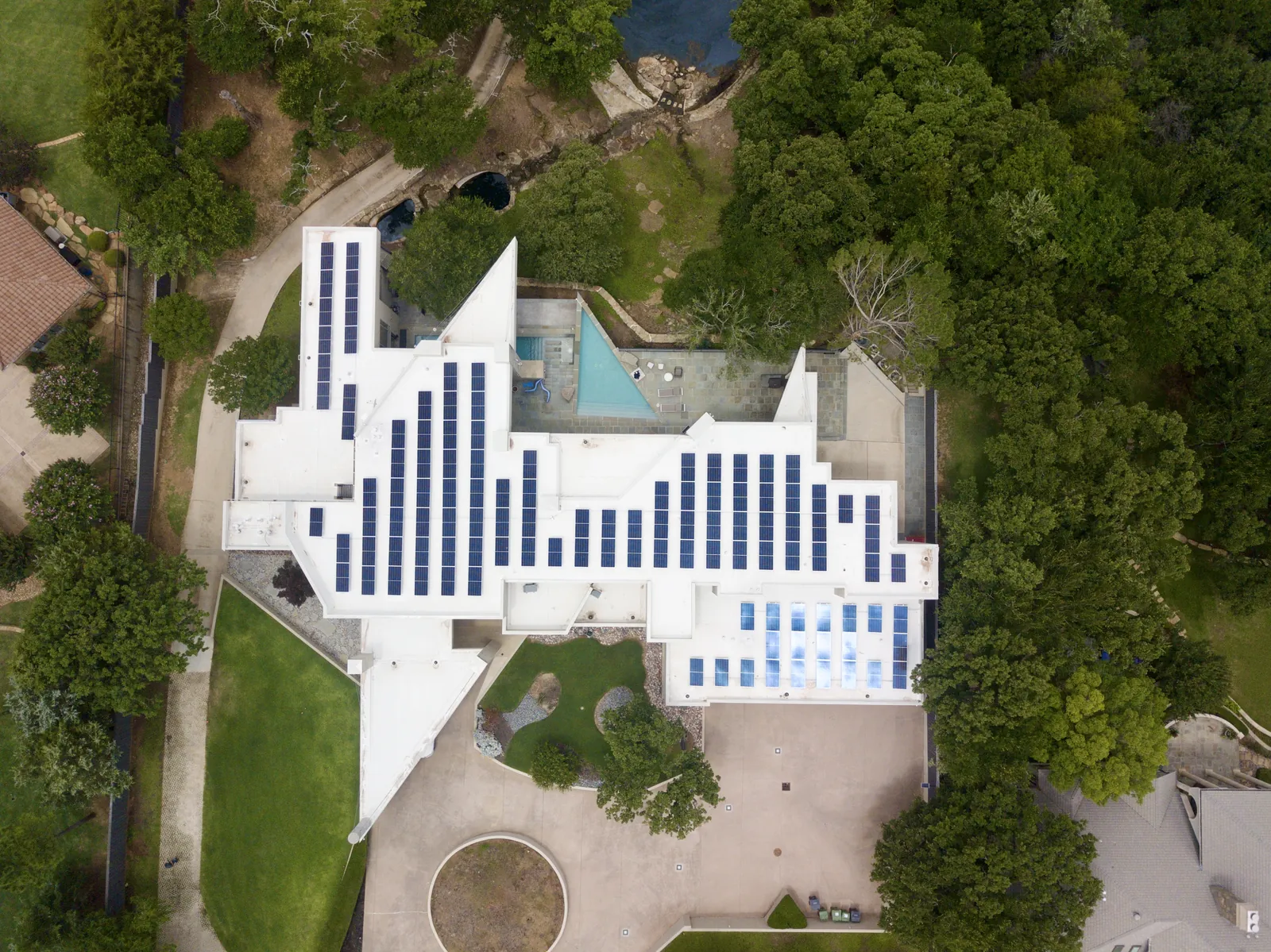 Aerial view of a home with an Eagle Solar Power rooftop system
